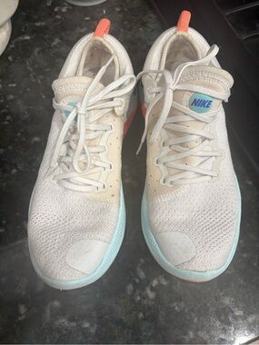 Nike Women’s White joyride Sneakers with Aqua and Coral Accents